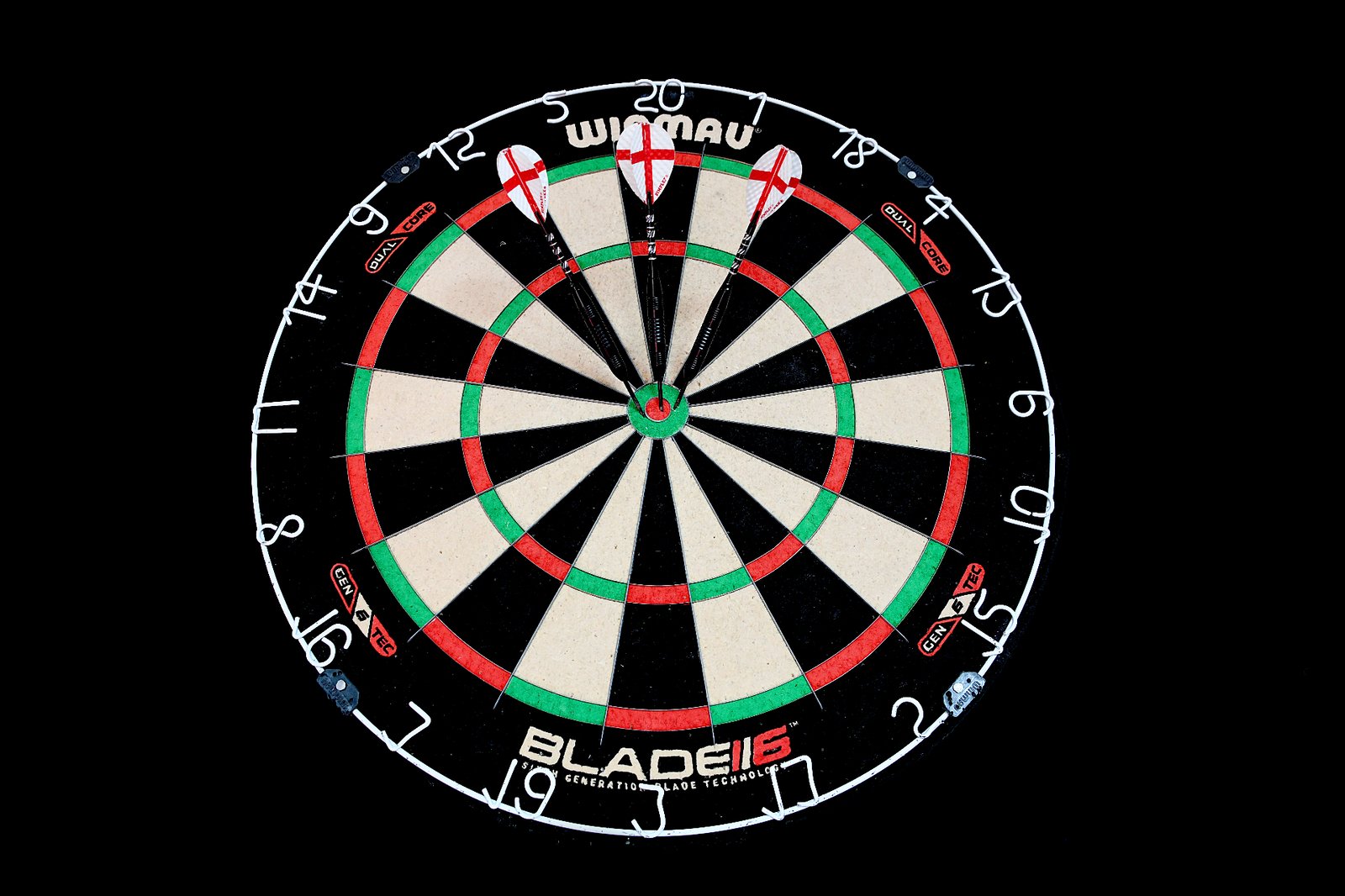 Darts and a scoreboard by the oche, ready for the evening's play.