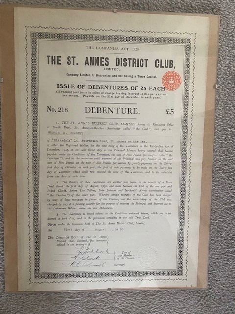 A £5 debenture certificate issued by The St Annes District Club Limited under the Companies Act 1929, numbered 216, bearing a red wax seal and the signatures of the secretary and a trustee.